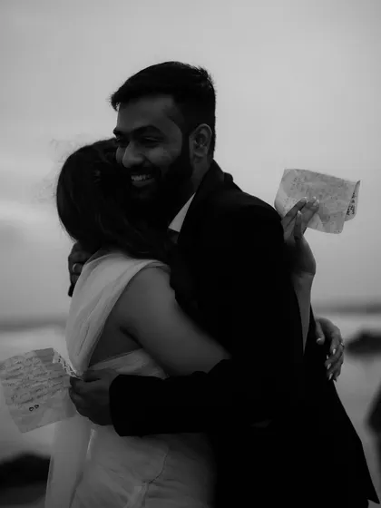 An emotional embrace after reading their vows to each other on the beach. These are the real, unscripted moments that hold so much meaning and become cherished memories.