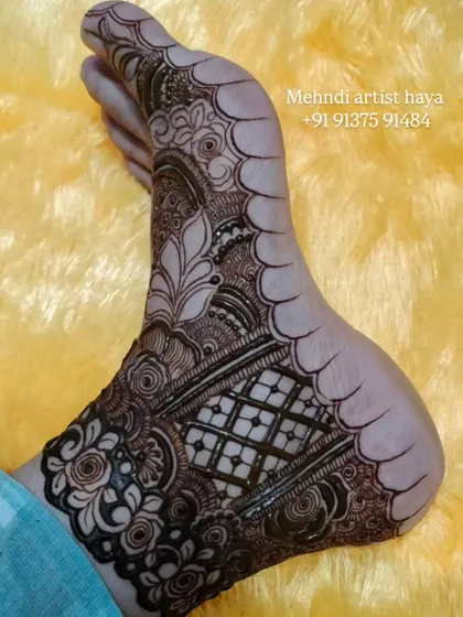 Another angle of the stained foot design, showing how the pattern extends along the side of the foot.