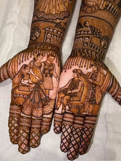 A detailed look at a family-centric bridal mehandi. The palms are filled with portraits of the couple and their family, creating a design that is full of love and connection.