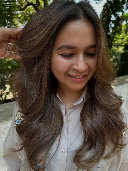 This is what a 'Beige Color Refresh' looks like. We took her faded, brassy hair and transformed it into this soft, beautiful beige blonde with a healthy shine.