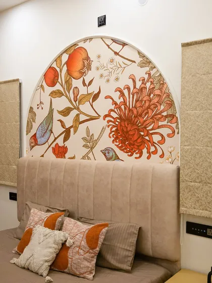 Details are the whispers in a home's story. This custom hand-painted mural, designed as an arched headboard, brings a unique artistic touch and a splash of colour, turning a simple wall into a personal masterpiece.