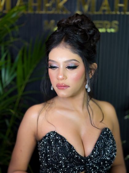 A classic portrait of the model, looking elegant and sophisticated with her glamorous makeup and hairstyle.