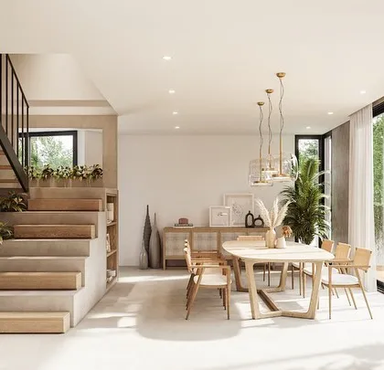 The dining area in the House of Veils is designed for both intimate meals and larger gatherings. The custom-designed table and chairs are complemented by a dramatic light fixture, creating a sophisticated yet inviting atmosphere.