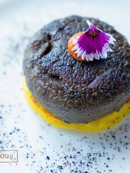 A close-up of the Beetroot Murabba Kebab, a dish that challenges perceptions of what a kebab can be. It's a true conversation starter.