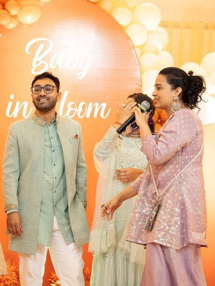 Capturing a funny, shy moment from a guest during a baby shower game. My interactive style ensures everyone feels involved and has a good laugh.