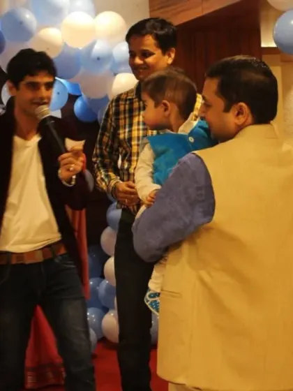 Interacting with the birthday boy and his family. I focus on making the guest of honor feel special throughout the event, from the grand entry to the cake cutting.