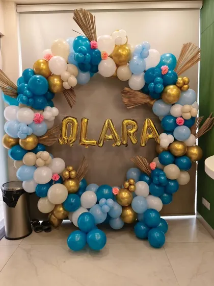 A clear, centered shot of the personalized "Olara" balloon ring.