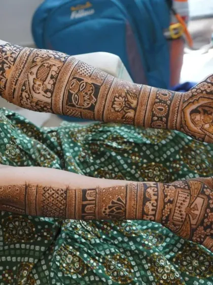 A candid shot of a bride with her full mehndi. It's so rewarding to see the complete design come together after hours of work.
