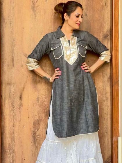 Here I am modeling for a designer label, with makeup and hair I did myself. The look is simple and elegant, featuring a clean base, defined eyes, and a tidy updo to complement the ethnic wear.