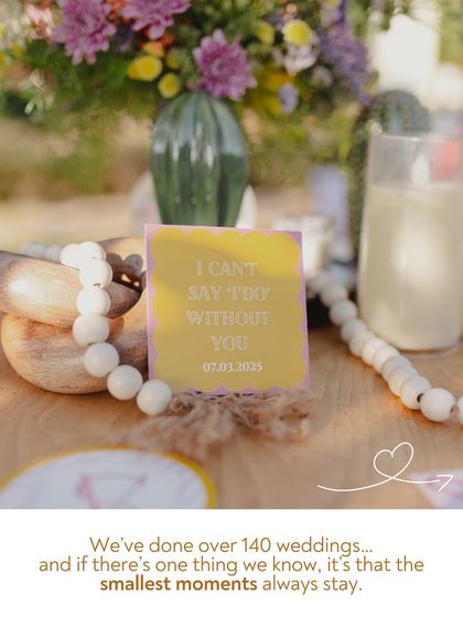 A small sign reads, "I can't say 'I do' without you." After over 140 weddings, we know it's these smallest, most heartfelt moments and details that stay with you forever.