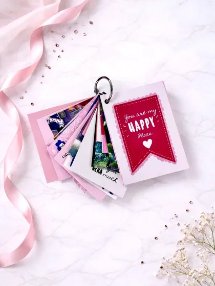 My mini tag photo album, held together by a ring. This one has a "You are my Happy Place" card on the front.