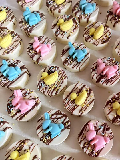 These chocolate-covered Oreos are a fun and colorful addition to any Easter basket. I dip each cookie in white chocolate and top it with a chocolate drizzle and a cute pastel bunny.