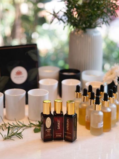 A collection of essential oils and candles from my Olfactory Odyssey workshop. In this session, I guide you on a journey into the magic of scent, where you can learn about aromatherapy and even create your own fragrance.