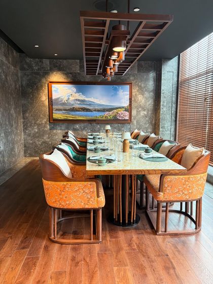 The private dining room at 32 East, The Leela Ambience, has a modern oriental inspired decor. I capture these interior details to showcase the restaurant's ambiance, which is a huge part of the fine dining experience.
