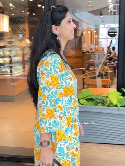 Step into festive elegance with our exquisite yellow and blue floral kurta pant set. The kurta has two pockets and is versatile enough to be worn as a dress.