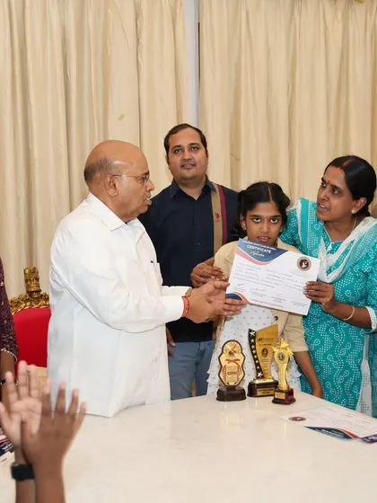 A truly proud moment as one of our young dancers receives a certificate of appreciation from the Honorable Governor of Karnataka, Shri Thawar Chand Gehlot. This recognition highlights the incredible dedication of our students.