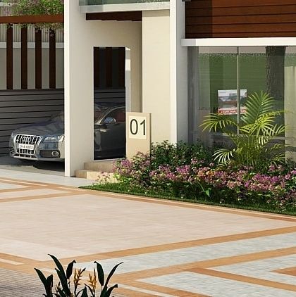 The entrance to the first unit in the row house development, establishing the design language of clean lines, modern materials, and integrated greenery.