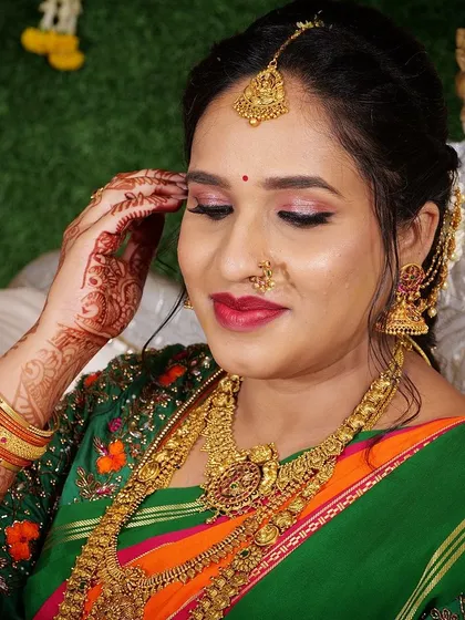 A candid moment from Yashaswini's baby shower. The makeup is designed to look beautiful in all lighting.