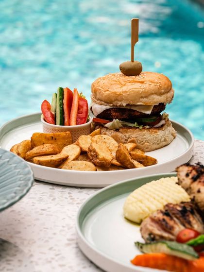 Celebrate special occasions like Father's Day with a themed brunch at Terra. This delicious burger and fries platter is just one of the many indulgent options available.