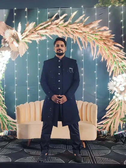 My look for a Sangeet night in Silvassa. I always dress to match the grandeur of the occasion, and a classic black Indo-western is perfect for an elegant evening.