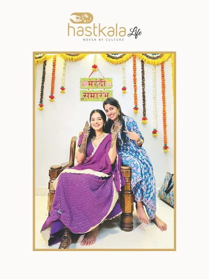A picture from my 'Hastkala Life' feature, showing me with a happy bride during her mehendi ceremony.