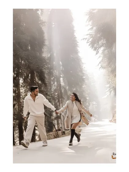 A joyful, candid moment from a pre-wedding shoot in the snowy forests of Kashmir. It shows my ability to capture natural interactions and happiness in breathtaking landscapes.