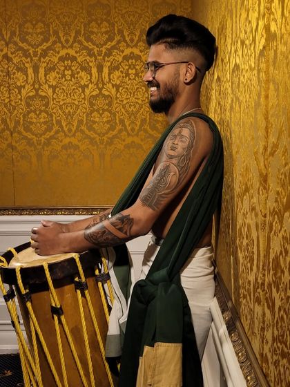 A stylish portrait of one of our artists. My team members combine a modern aesthetic with a deep respect for the traditional art of Chenda.