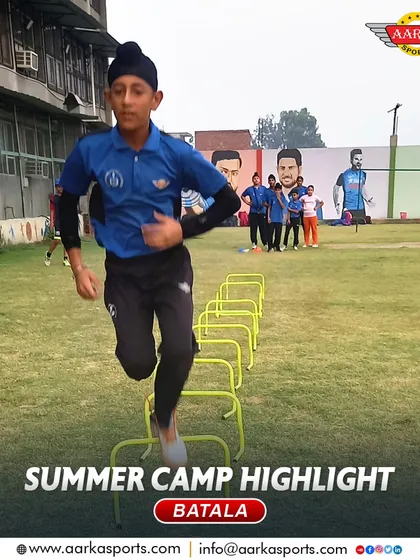 A young player works on his agility by navigating through hurdles during our summer camp. Fitness is a core component of our camp curriculum.