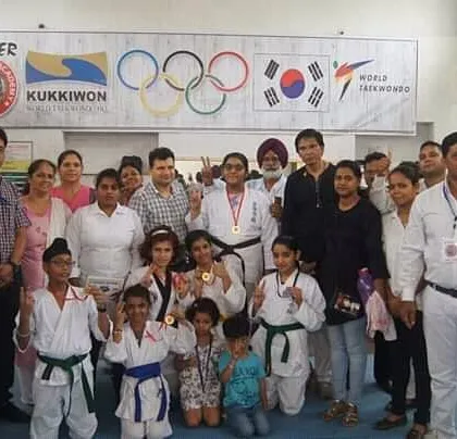 Together, we can do so much. Our team, students, and parents celebrating together after a successful event at the Kukkiwon Taekwondo championship.