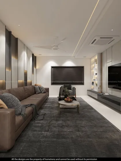 This living room balances dark and light elements. The rich brown leather sofa is set against a backdrop of white marble and dark grey wall panels, all highlighted by integrated strip lighting.