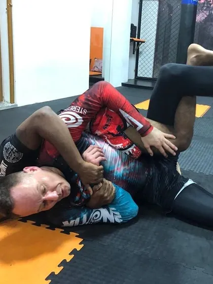 Here I am working on a submission with Professor Bernd Roeske during his visit. Continuous learning from other high-level practitioners is key to my own growth as a coach.