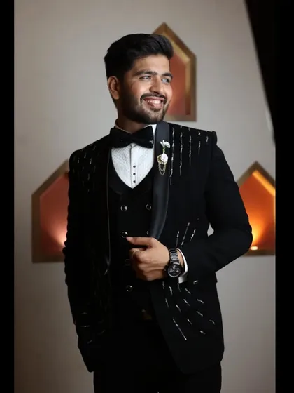 A confident pose from the groom. My reception styling is all about creating a look that is both elegant and modern.