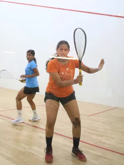 Two female players in the midst of a competitive rally. The women's categories at our tournaments consistently feature high-quality and exciting matches.
