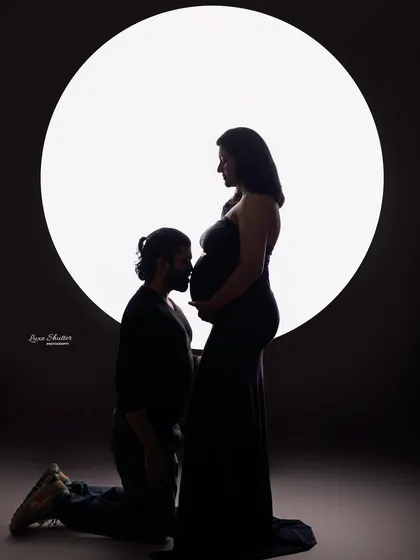 A timeless silhouette portrait that speaks volumes without a word. I love using dramatic lighting to focus on the beautiful connection between a couple and the new life they are waiting for.