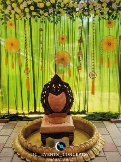 A classic and beautiful Haldi ceremony setup. We used traditional elements like marigold flowers and a decorated ceremonial seat, set against a vibrant lime green backdrop to create a fresh yet culturally rich atmosphere.