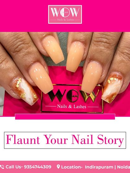 These coffin-shaped extensions feature a beautiful marble effect with delicate gold foil accents. This design showcases how we combine different techniques to create a truly unique and luxurious set of nails.