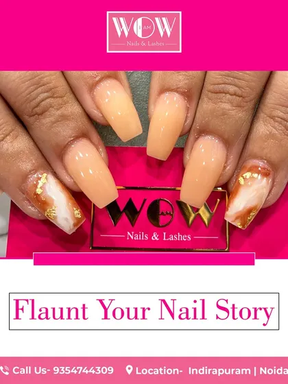 These coffin-shaped extensions feature a beautiful marble effect with delicate gold foil accents. This design showcases how we combine different techniques to create a truly unique and luxurious set of nails.