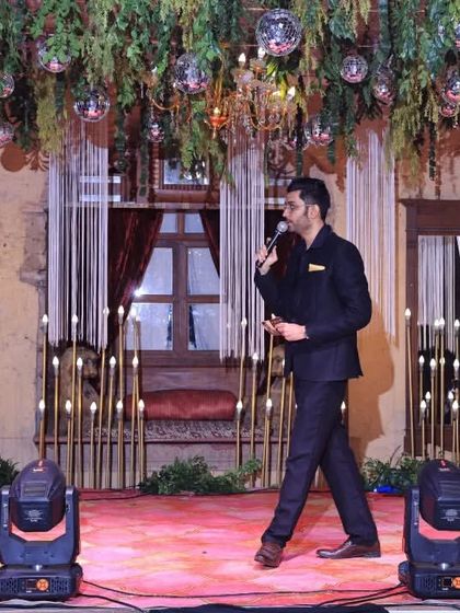 Another shot of me owning the stage, mic in hand, ready to take the celebration to the next level.