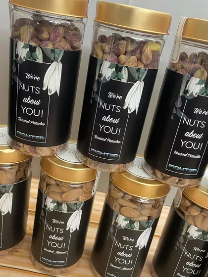 'We're nuts about you!' Custom-branded jars of roasted almonds and pistachios for the 'Fighter' team.