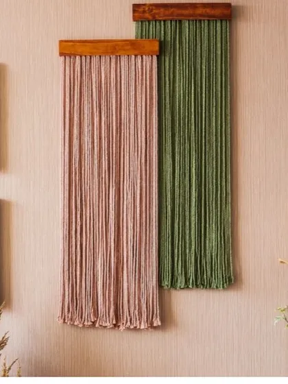 A wider view reveals how our macrame wall sculptures integrate seamlessly into a living space. Placed alongside houseplants and other decor, they bring a soft, organic element that warms up the entire room.