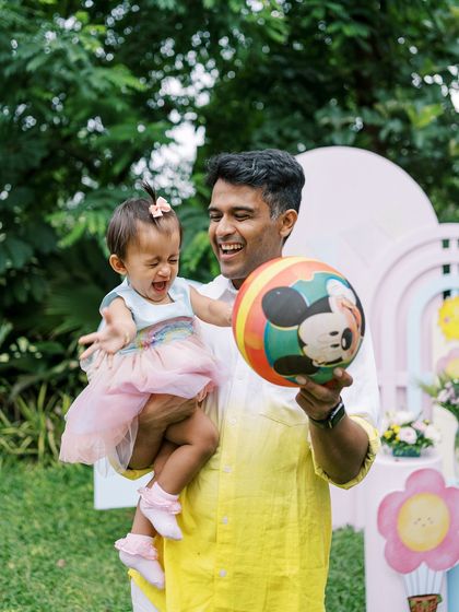 The wild and wonderful energy of a dad playing with his daughter. These are the moments of pure fun and safety that I love to document.