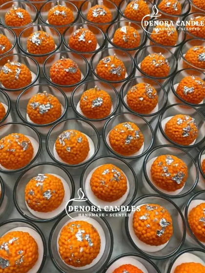 A large batch of my popular laddoo candles, decorated with silver leaf and ready for festive orders.