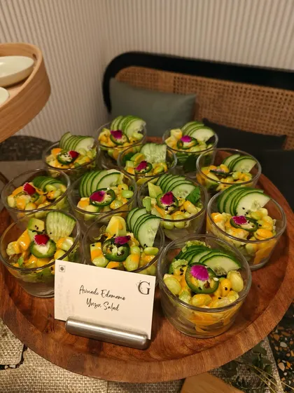 Individual cups of our Avocado Edamame Yuzu Salad. This refreshing and healthy option is perfect for guests to enjoy while mingling at a party.