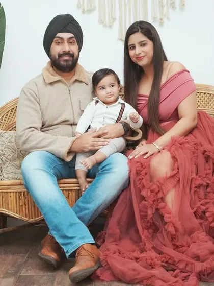 A full family portrait showcasing our natural, relaxed posing style. We aim to make everyone comfortable to capture genuine smiles and interactions.