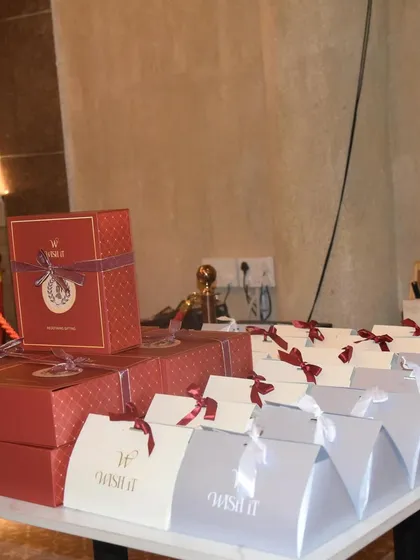 We believe in gifting that tells a story. For a Roman-themed launch party, we designed these elegant red and silver gift boxes, complete with custom seals. This is how we elevate event gifting from a simple giveaway to a memorable part of the guest experience.