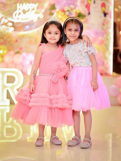 A sweet photo of the birthday girl with her sister or friend. I always make sure to capture photos with important guests and family members.