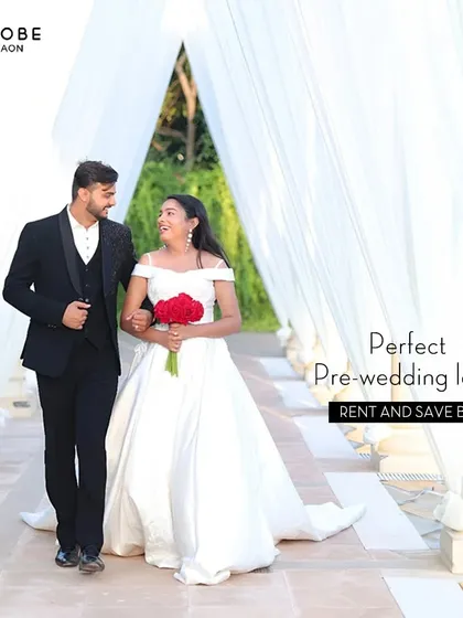 That perfect pre-wedding shoot look is right here. This flowing white gown creates magical, romantic moments you'll cherish forever. I have styles for him and her to create your dream photos.