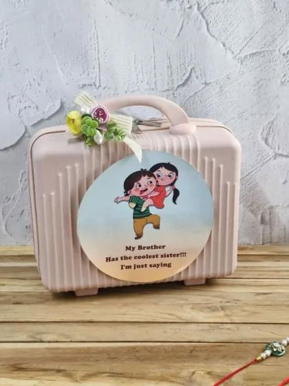 "My Brother has the coolest sister!!!" This fun and playful hamper is perfect for the sister who wants to send a little love and a little sass this Rakhi.