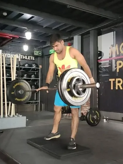 This single-leg barbell exercise is an advanced movement for building stability, balance, and unilateral leg strength. It's a great assistance exercise to correct imbalances and improve coordination.