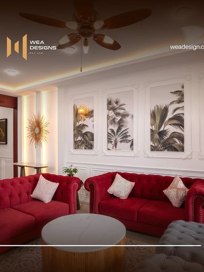 This image showcases the rich textures and colors of the neo-classical living room, from the velvet sofa to the warm wood tones and metallic accents.